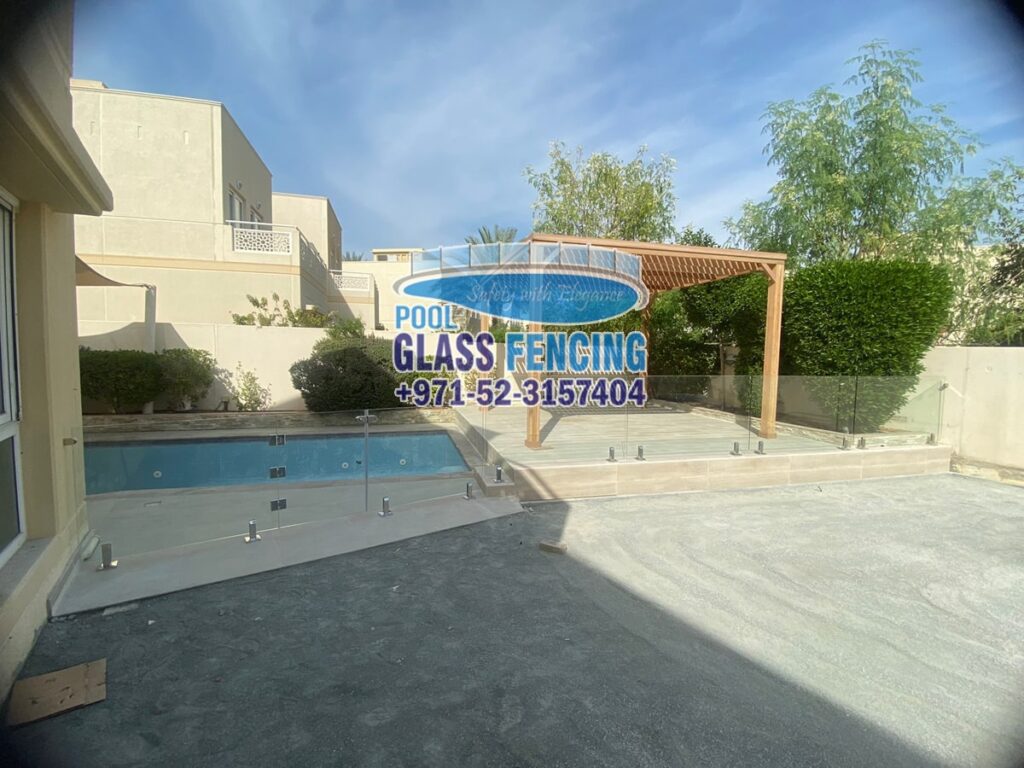 glass fencing in meadow spring